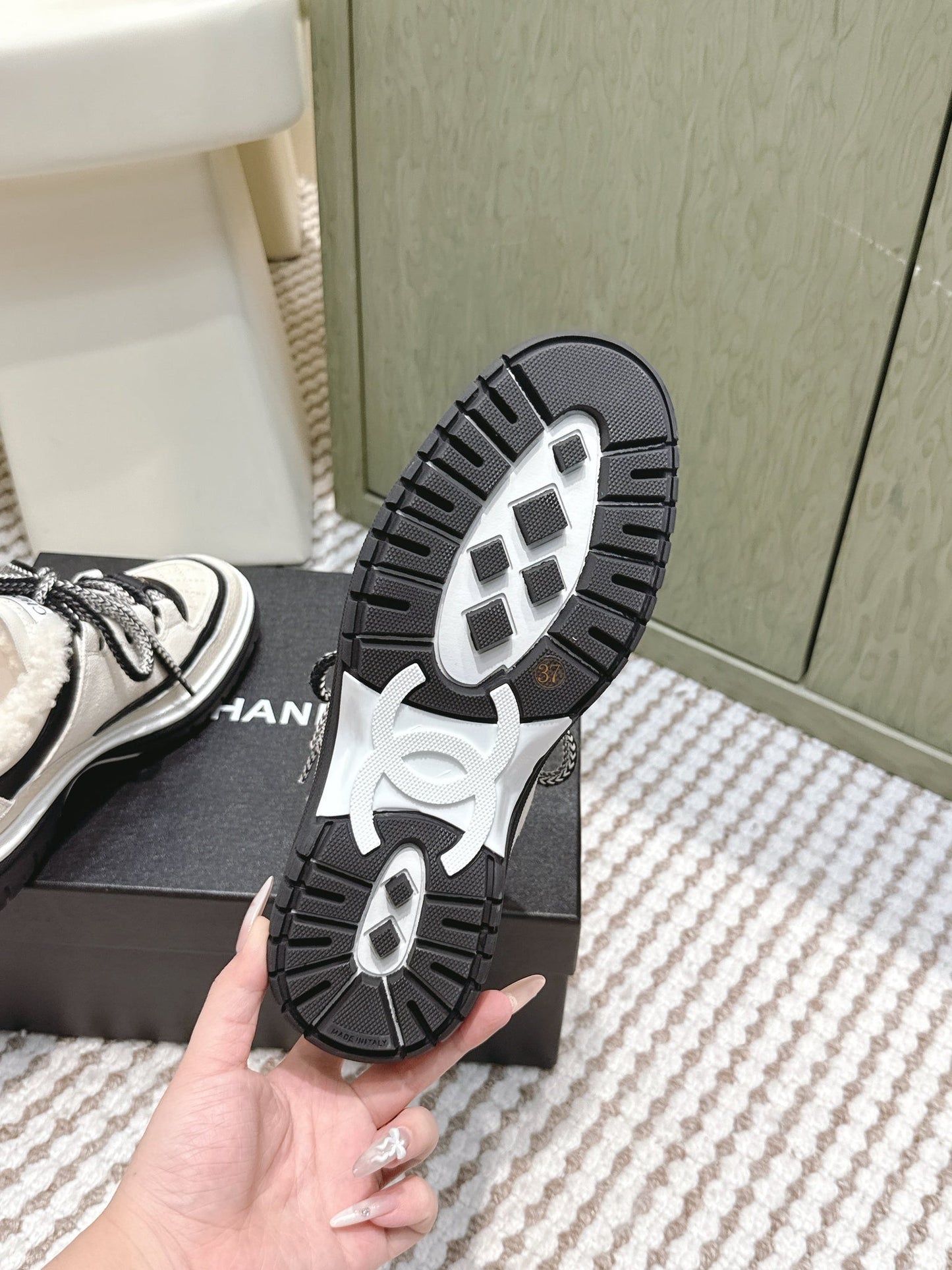 Chanel 26s Thick-Sole Sneakers In White And Black Calfskin With Fur Lining