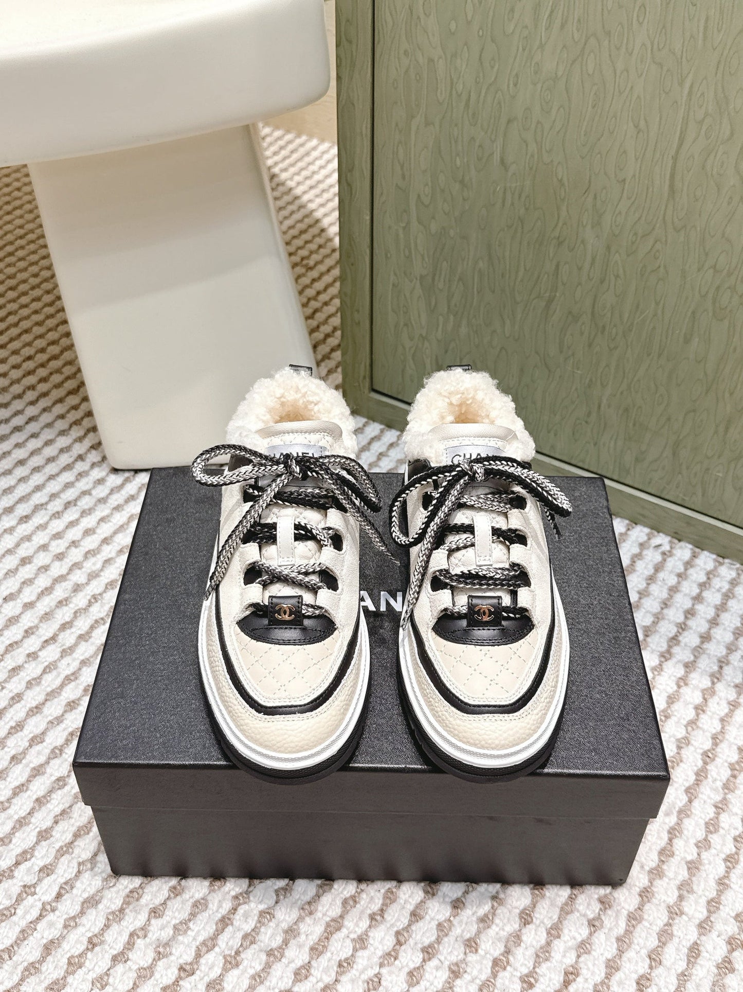 Chanel 26s Thick-Sole Sneakers In White And Black Calfskin With Fur Lining