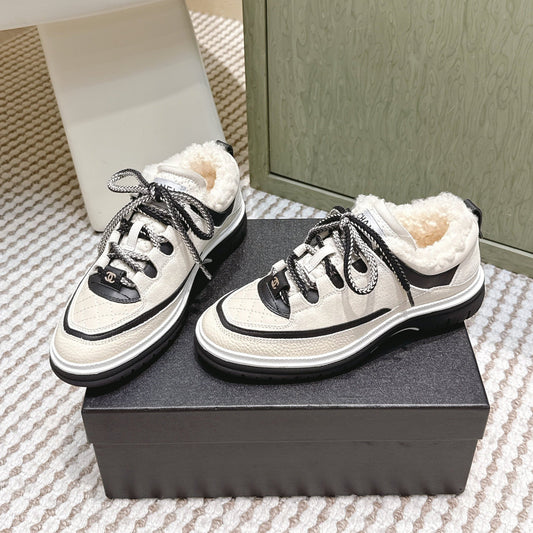 Chanel 26s Thick-Sole Sneakers In White And Black Calfskin With Fur Lining