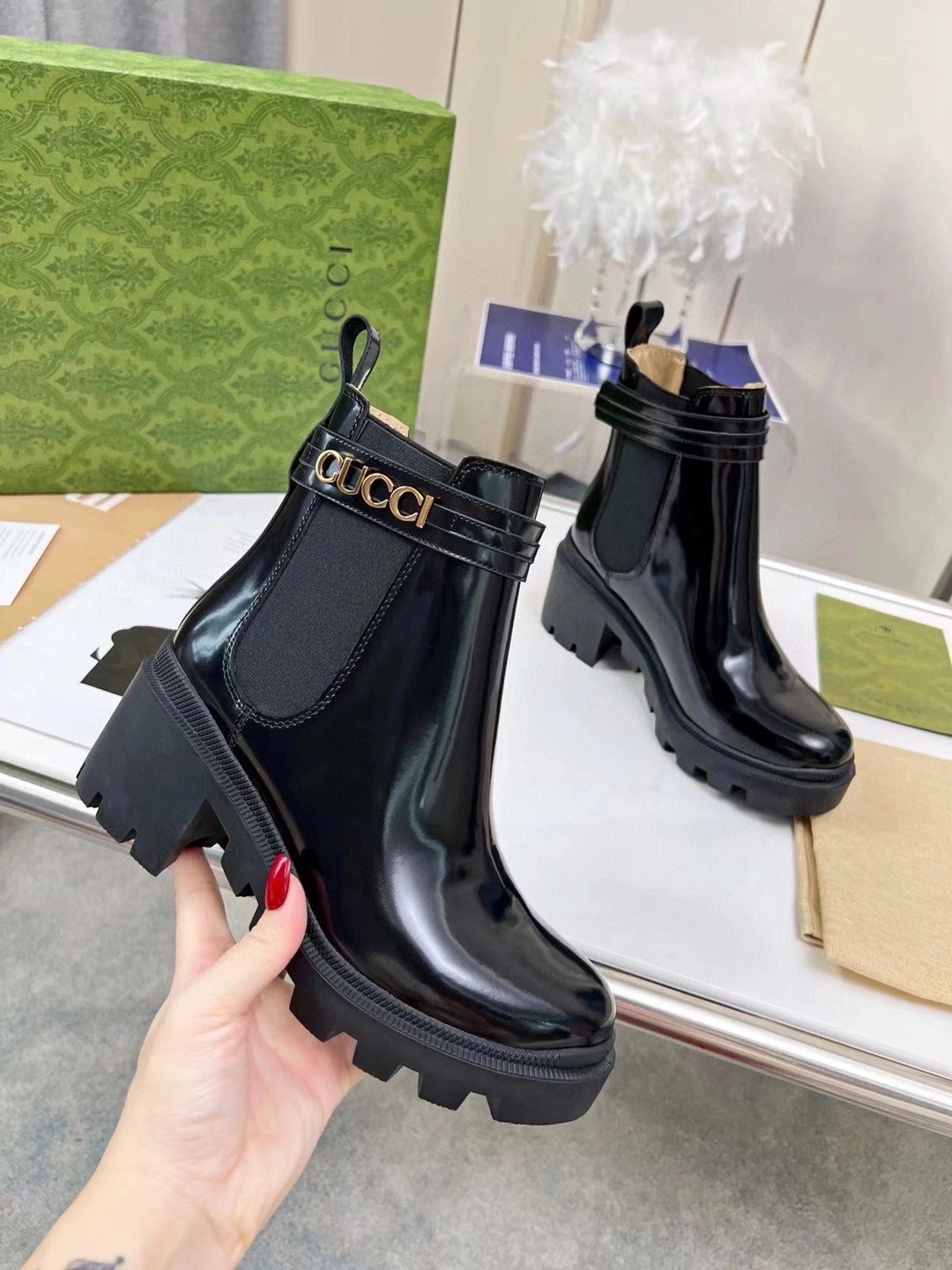 GG ankle boots black patent leather gold buckle