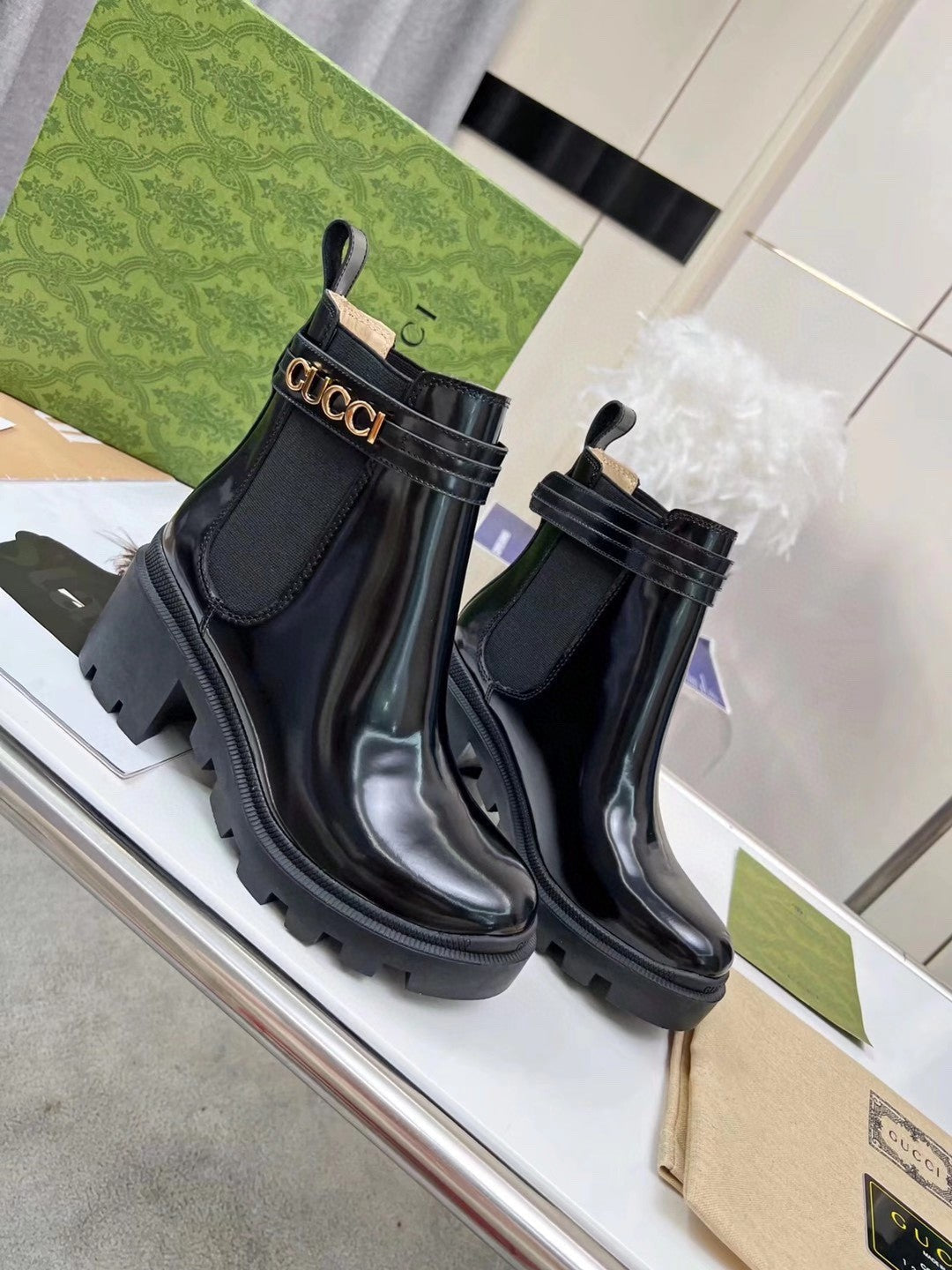 GG ankle boots black patent leather gold buckle