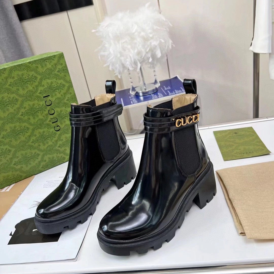GG ankle boots black patent leather gold buckle