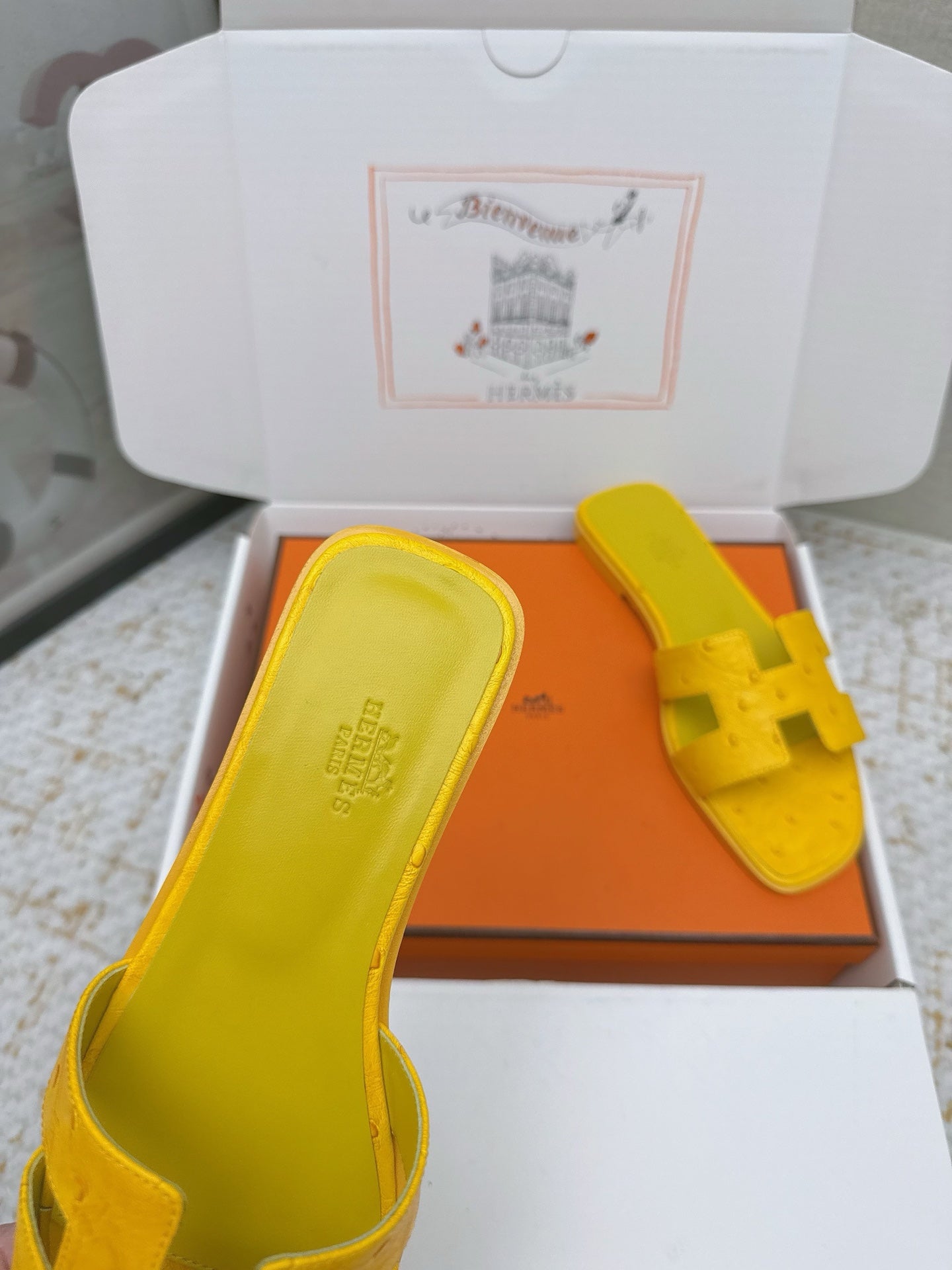 HM 26ss Oran Sandals Yellow Ostrich Leather 625090