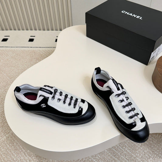 CC Métiers d’art 2026 Sneakers Black White Calfskin 859565