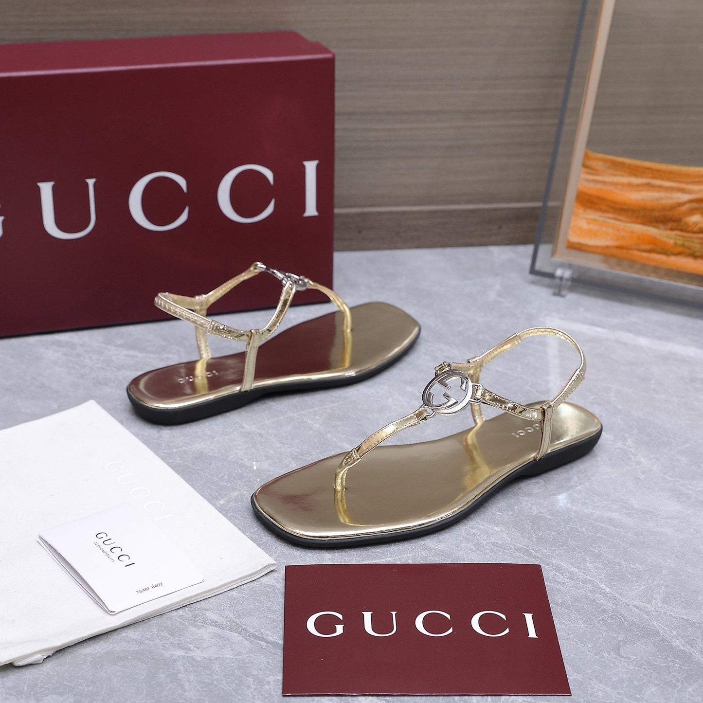 GG Thong Sandal With Interlocking G Gold Sheepskin 864295