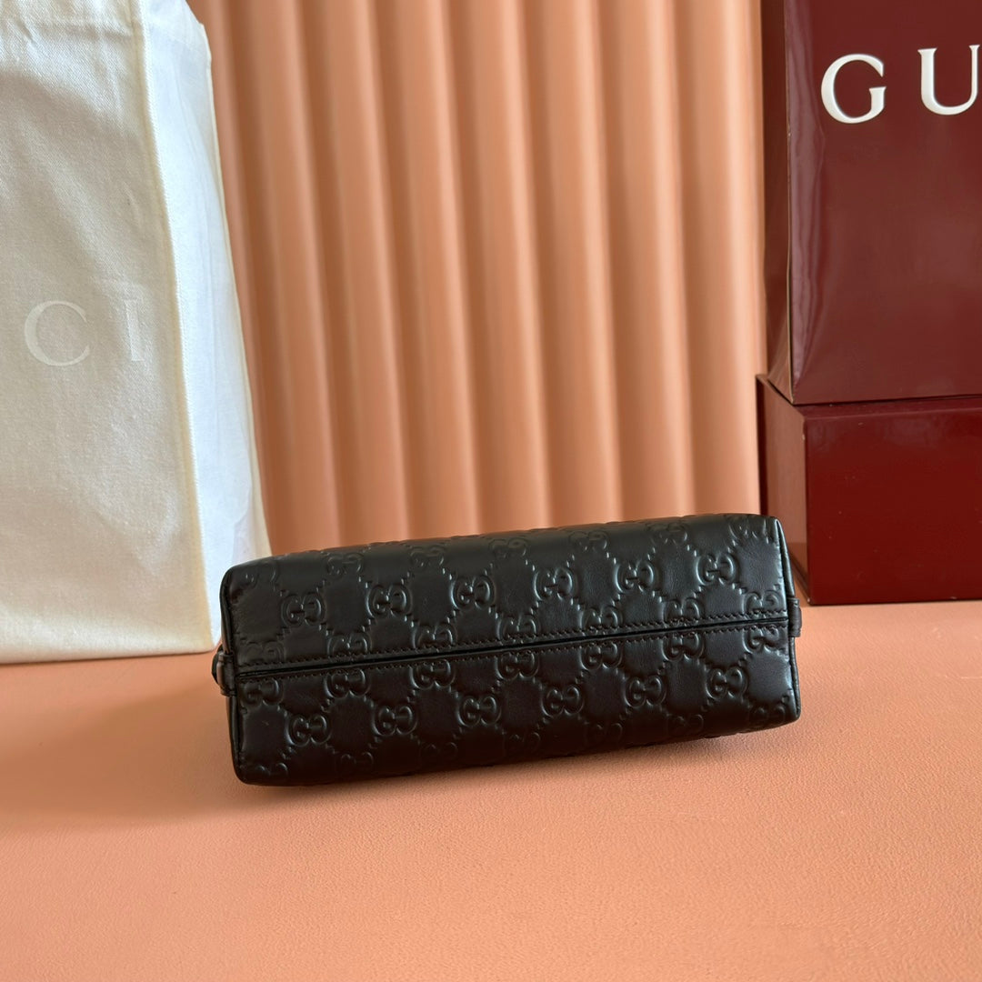 GG Emblem Shoulder Bag Black Embossed Cowhide