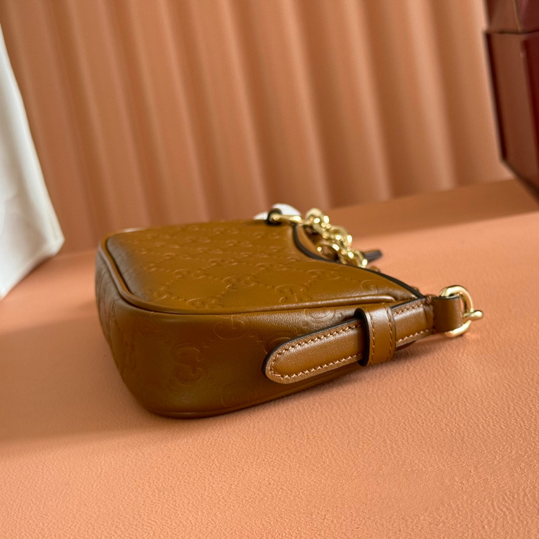GG Emblem Mini Shoulder Bag Brown Embossed Cowhide