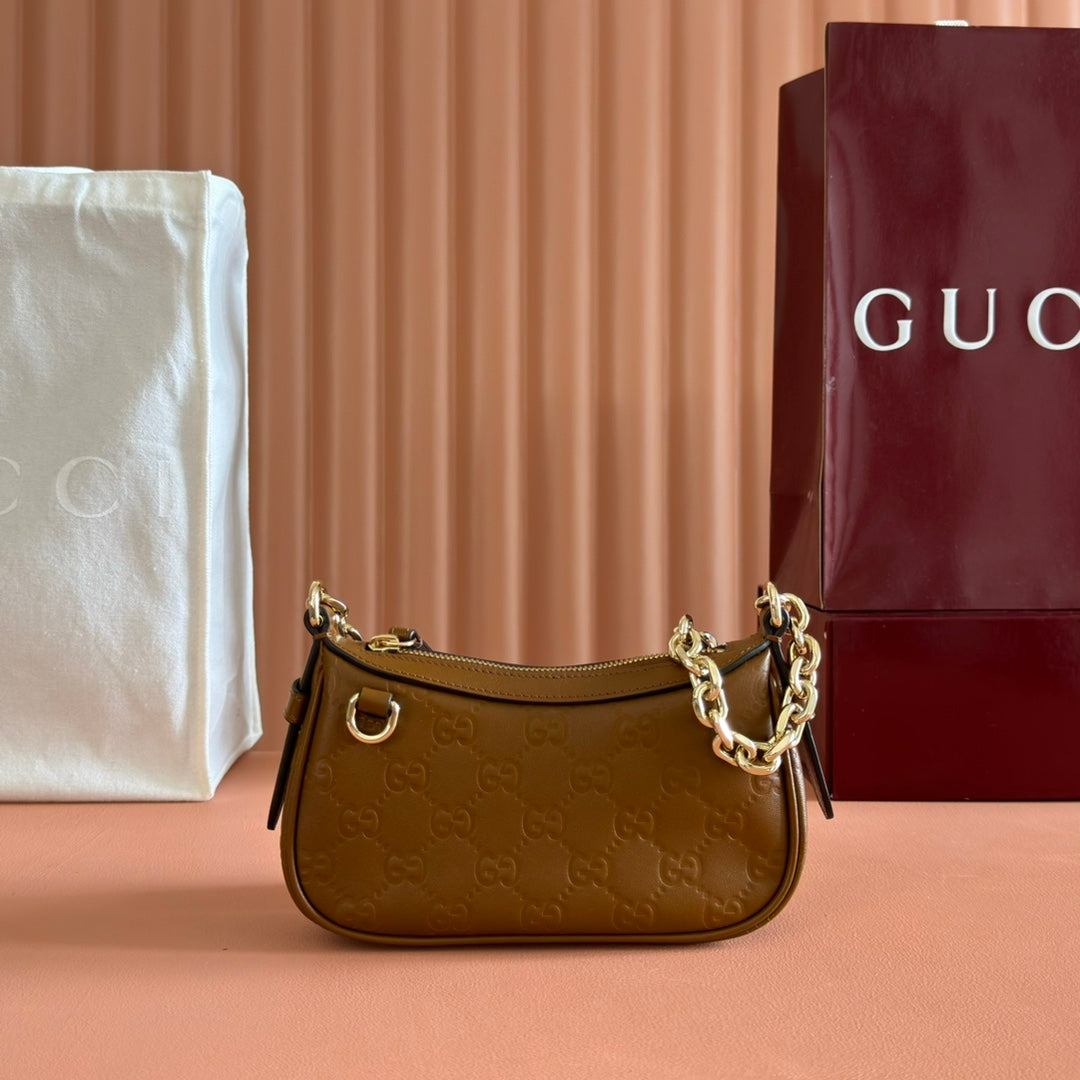 GG Emblem Mini Shoulder Bag Brown Embossed Cowhide