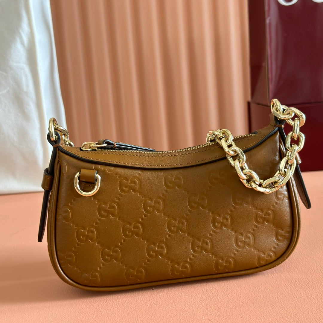 GG Emblem Mini Shoulder Bag Brown Embossed Cowhide
