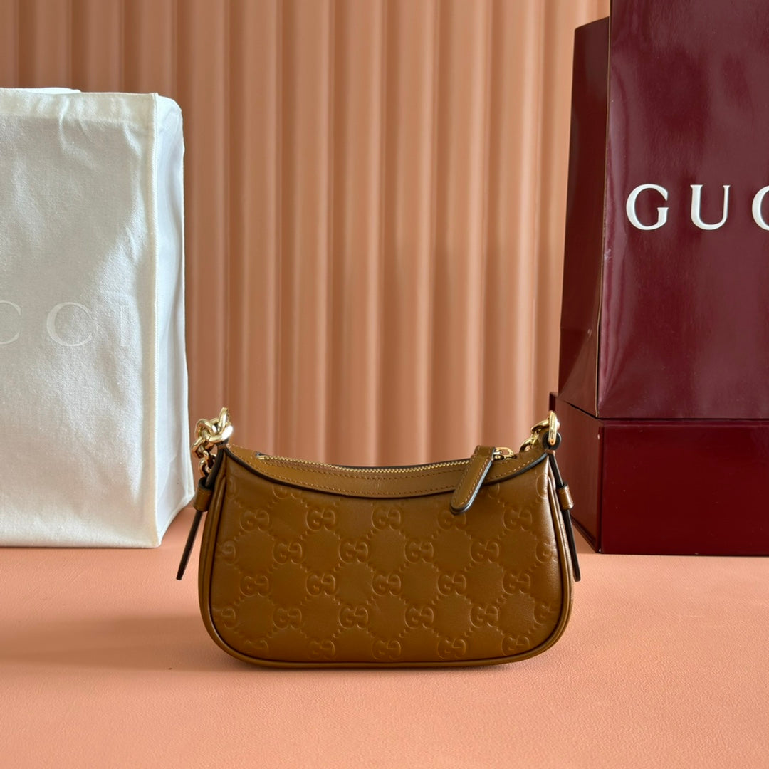 GG Emblem Mini Shoulder Bag Brown Embossed Cowhide