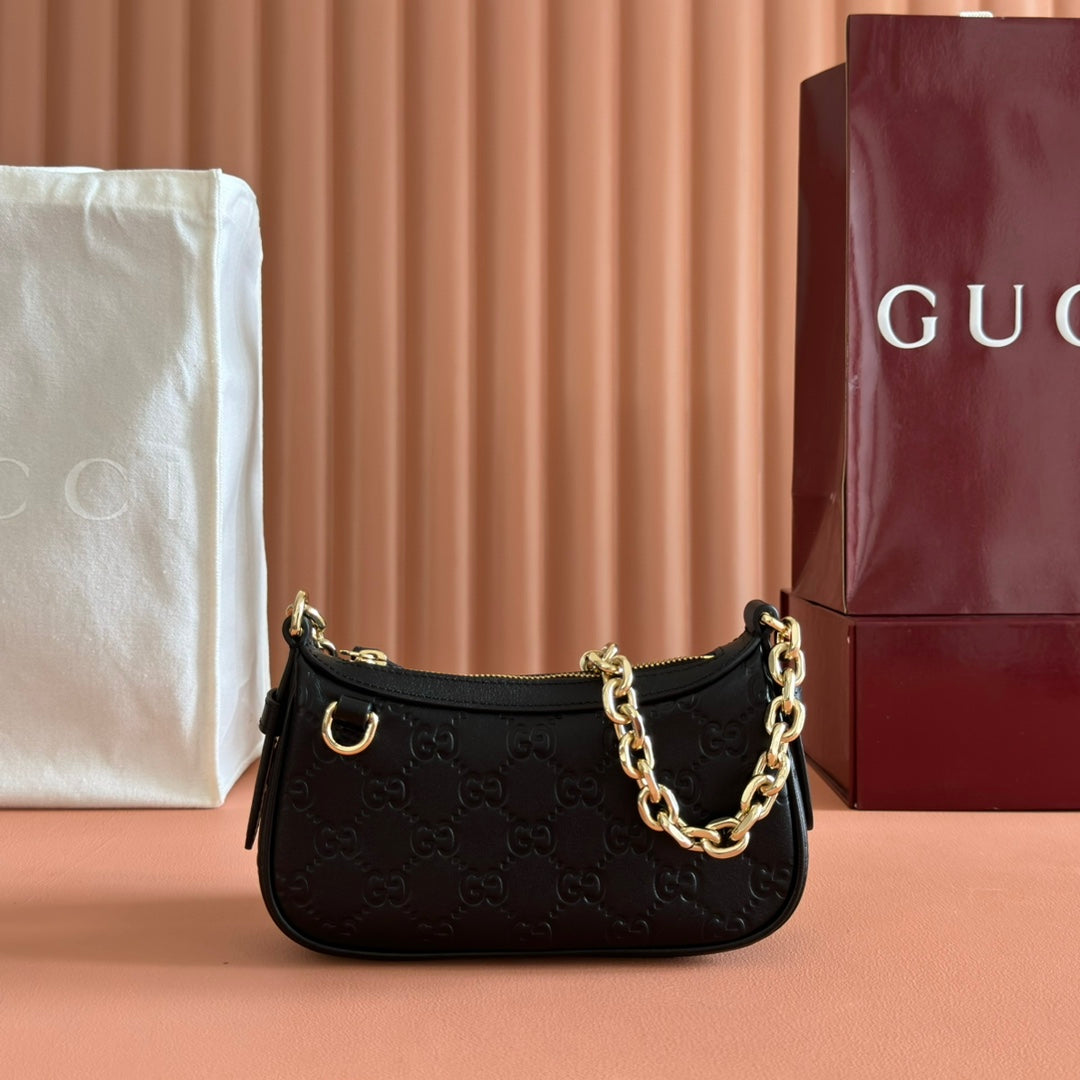 GG Emblem Mini Shoulder Bag Black Embossed Cowhide