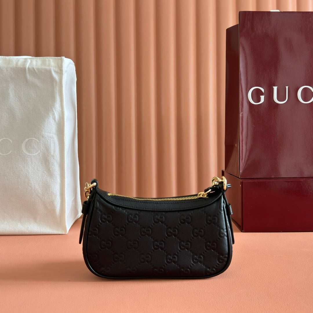 GG Emblem Mini Shoulder Bag Black Embossed Cowhide